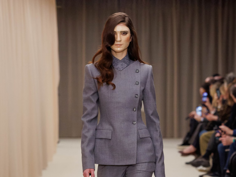 runway image from alexander McQueens aw26 collection, model wears mask
